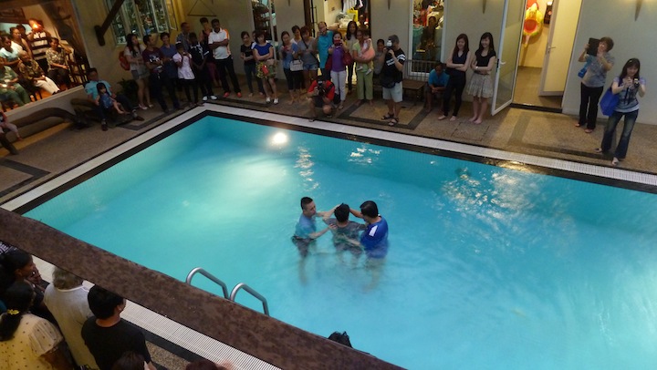 Baptism in the swimming pool
